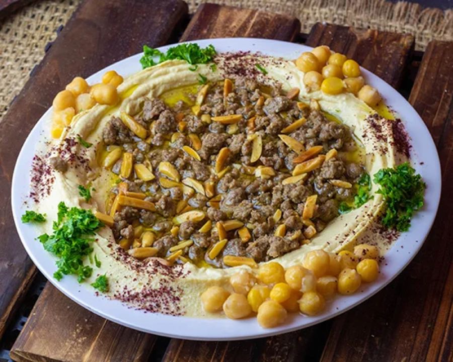 Hummus topped with ground beef